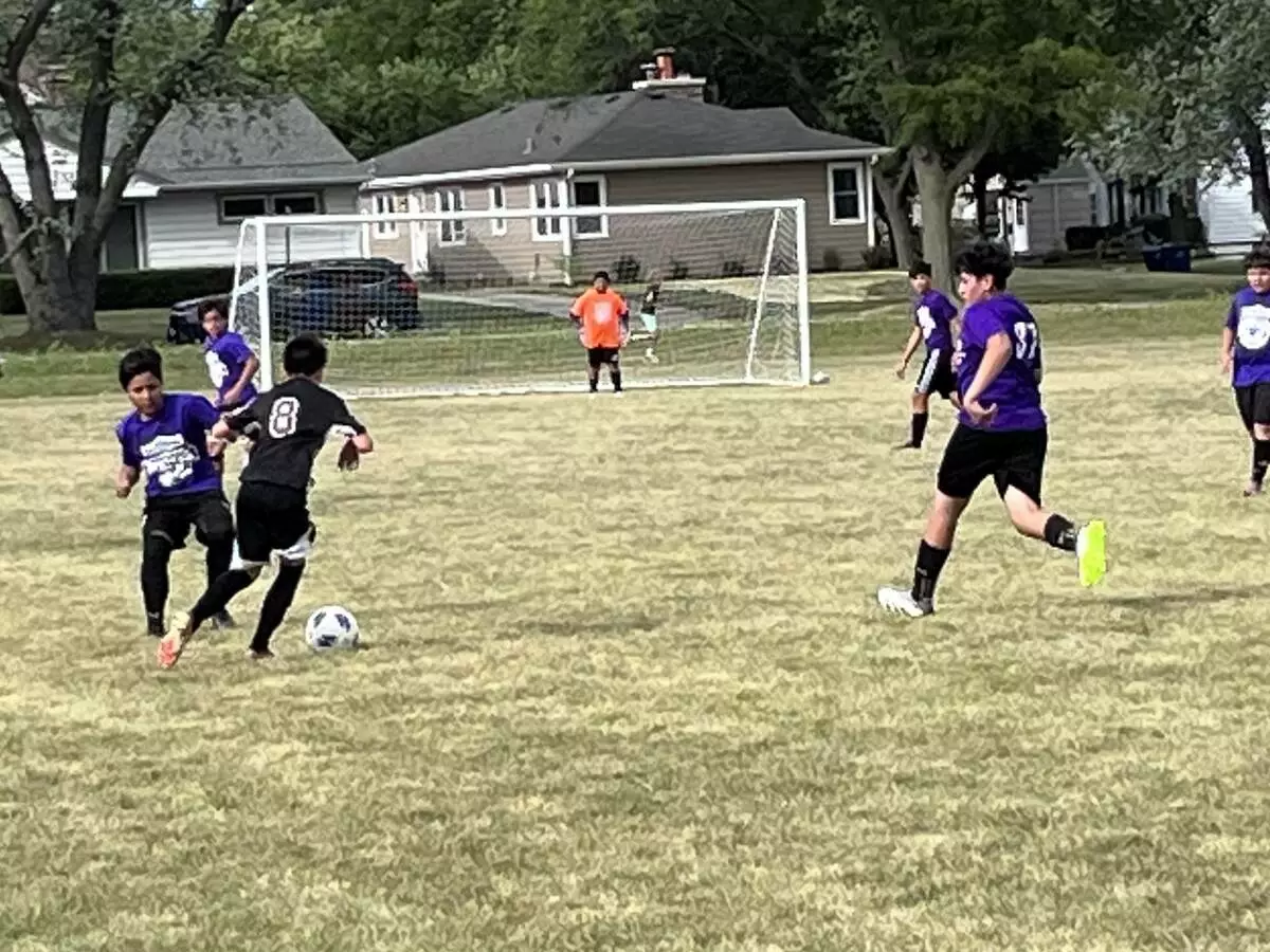 Player working on getting the ball into a better position on the field.
